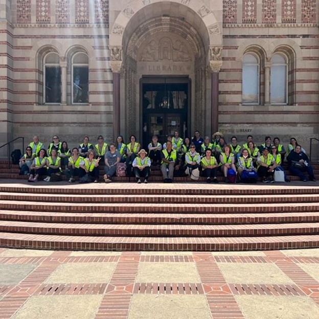 Image caption: The 2022 NHR cohort gathered outside of UCLAʻs Powell Library. Image credit: Robin Bauer Kilgo.